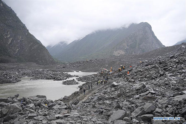 Rescuers work at the accident site after a landslide occurred in Xinmo village of Maoxian county, Tibetan and Qiang autonomous prefecture of Aba, Southwest China's Sichuan province, June 24, 2017. (Photo/Xinhua) Rescuers work at the accident site after a landslide occurred in Xinmo village of Maoxian county, Tibetan and Qiang autonomous prefecture of Aba, Southwest China's Sichuan province, June 24, 2017. (Photo/Xinhua)