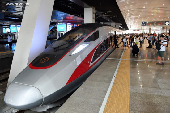 Photo taken on June 26, 2017 shows the China's new bullet train Fuxing at Beijing South Railway Station in Beijing, capital of China. China's next generation bullet train Fuxing debuted on the Beijing-Shanghai line on Monday. (Xinhua/Ju Huanzong) Photo taken on June 26, 2017 shows the China's new bullet train Fuxing at Beijing South Railway Station in Beijing, capital of China. China's next generation bullet train Fuxing debuted on the Beijing-Shanghai line on Monday. (Xinhua/Ju Huanzong)