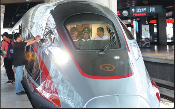 China's new bullet train model is launched on the Beijing-Shanghai high-speed rail line at Beijing South Railway Station on Monday.Zou Hong / China Daily China's new bullet train model is launched on the Beijing-Shanghai high-speed rail line at Beijing South Railway Station on Monday.Zou Hong / China Daily