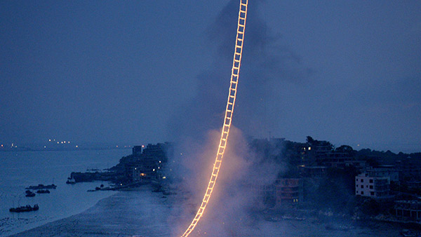 The semi-biographical documentary Sky Ladder: The Art of Cai Guo-qiang features Sky Ladder, a work by Cai using gunpowder, part of his Projects for Extraterrestrials. Photos provided to China Daily The semi-biographical documentary Sky Ladder: The Art of Cai Guo-qiang features Sky Ladder, a work by Cai using gunpowder, part of his Projects for Extraterrestrials. Photos provided to China Daily