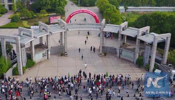 Students shake hands with their teachers after finishing their first subject of the examination in Beijing on June 7, 2017. (Xinhua/Wang Huajuan) Students shake hands with their teachers after finishing their first subject of the examination in Beijing on June 7, 2017. (Xinhua/Wang Huajuan)
