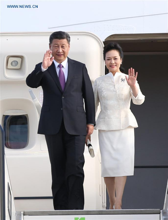 Chinese President Xi Jinping and his wife Peng Liyuan wave upon their arrival in Berlin, Germany, July 4, 2017. Xi arrived here on Tuesday for his second state visit to Germany. (Xinhua/Yao Dawei) Chinese President Xi Jinping and his wife Peng Liyuan wave upon their arrival in Berlin, Germany, July 4, 2017. Xi arrived here on Tuesday for his second state visit to Germany. (Xinhua/Yao Dawei)