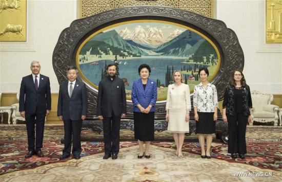 Chinese Vice Premier Liu Yandong (C) meets with heads of foreign delegations attending a meeting of BRICS ministers of education, in Beijing, capital of China, July 5, 2017. (Xinhua/Li Tao) Chinese Vice Premier Liu Yandong (C) meets with heads of foreign delegations attending a meeting of BRICS ministers of education, in Beijing, capital of China, July 5, 2017. (Xinhua/Li Tao)