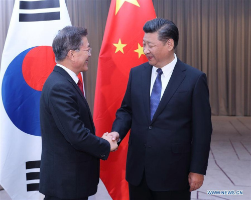 Chinese President Xi Jinping (R) meets with his South Korean counterpart Moon Jae-in in Berlin, Germany, July 6, 2017. (Xinhua/Wang Ye) Chinese President Xi Jinping (R) meets with his South Korean counterpart Moon Jae-in in Berlin, Germany, July 6, 2017. (Xinhua/Wang Ye)