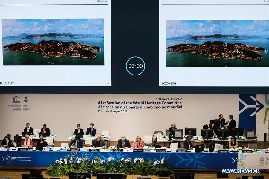 Photo taken on July 8, 2017 shows the session of the World Heritage Committee in Krakow, Poland. The 41st session of the World Heritage Committee on Saturday decided to put China's Gulangyu historic international settlement on the prestigious World Heritage List as a cultural site. So far, China has 52 sites inscribed to the List. (Xinhua/Chen Xu)