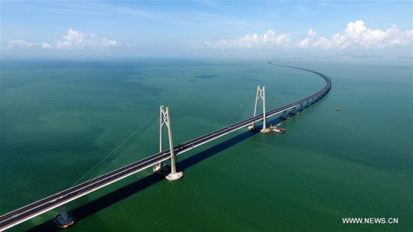 Photo taken on June 6, 2017 shows the Hong Kong-Zhuhai-Macao Bridge under construction. The main structure of world's longest cross-sea bridge linking Hong Kong, Zhuhai, and Macao was finished on July 7, 2017. (Xinhua/Liang Xu) Photo taken on June 6, 2017 shows the Hong Kong-Zhuhai-Macao Bridge under construction. The main structure of world's longest cross-sea bridge linking Hong Kong, Zhuhai, and Macao was finished on July 7, 2017. (Xinhua/Liang Xu)