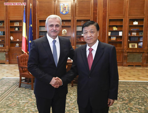 Liu Yunshan (R), a member of the Standing Committee of the Political Bureau of the Communist Party of China (CPC) Central Committee, meets with Liviu Dragnea, chairman of Romania's ruling Social Democratic Party (PSD) and speaker of the Chamber of Deputies, in Bucharest, Romania, July 14, 2017. (Xinhua/Pang Xinglei) Liu Yunshan (R), a member of the Standing Committee of the Political Bureau of the Communist Party of China (CPC) Central Committee, meets with Liviu Dragnea, chairman of Romania's ruling Social Democratic Party (PSD) and speaker of the Chamber of Deputies, in Bucharest, Romania, July 14, 2017. (Xinhua/Pang Xinglei)