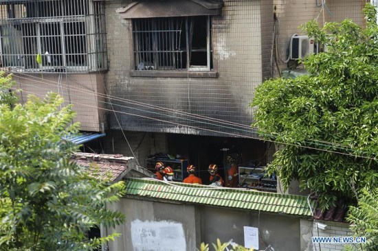 Rescuers work at the site of a house fire in Changshu, east China's Jiangsu Province, July 16, 2017. Police in Jiangsu said they have arrested a suspect for alleged arson after a fire engulfed a house that claimed 22 lives Sunday morning. (Xinhua/Ji Chunpeng) Rescuers work at the site of a house fire in Changshu, east China's Jiangsu Province, July 16, 2017. Police in Jiangsu said they have arrested a suspect for alleged arson after a fire engulfed a house that claimed 22 lives Sunday morning. (Xinhua/Ji Chunpeng)