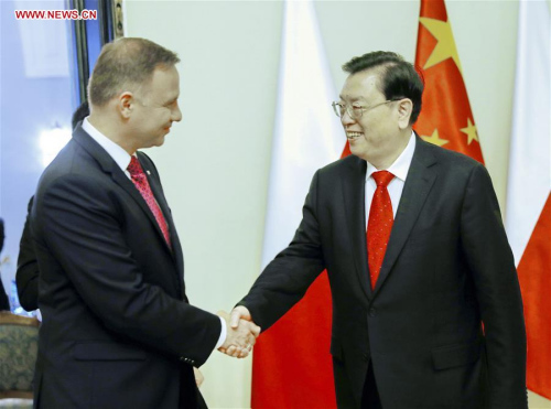 Zhang Dejiang (R), chairman of the Standing Committee of China's National People's Congress (NPC), meets with Polish President Andrzej Duda, in Warsaw, Poland, July 16, 2017.  (Xinhua/Ju Peng)