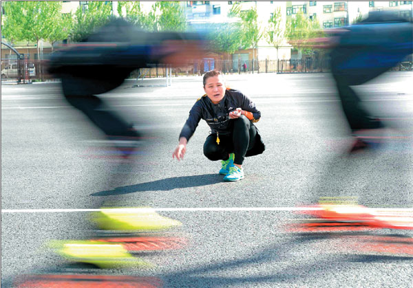 Zhang Jie coaches the Special Olympics short-track speedskating team she founded in Qitaihe, Heilongjiang province.Photos By Wang Kai / Xinhua Zhang Jie coaches the Special Olympics short-track speedskating team she founded in Qitaihe, Heilongjiang province.Photos By Wang Kai / Xinhua