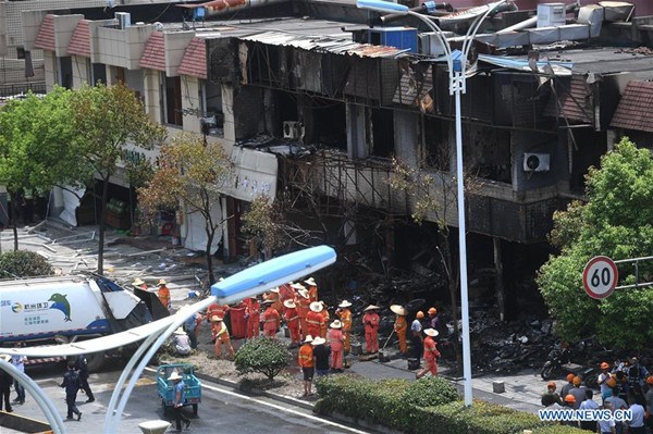 Photo taken on July 21, 2017 shows the general view of the blast site in Hangzhou of east China's Zhejiang Province. Local authorities said that two people were confirmed dead and 55 others injured after a blast occurred in a shop near the West Lake in the city. (Xinhua/Huang Zongzhi) Photo taken on July 21, 2017 shows the general view of the blast site in Hangzhou of east China's Zhejiang Province. Local authorities said that two people were confirmed dead and 55 others injured after a blast occurred in a shop near the West Lake in the city. (Xinhua/Huang Zongzhi)
