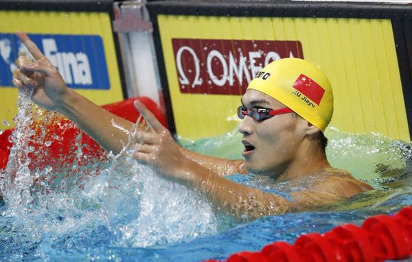 Xu Jiayu of China celebrates after winning the men's 100m backstroke at the 17th FINA World Championships in Budapest, July 25, 2017. (Photo/Agencies) Xu Jiayu of China celebrates after winning the men's 100m backstroke at the 17th FINA World Championships in Budapest, July 25, 2017. (Photo/Agencies)