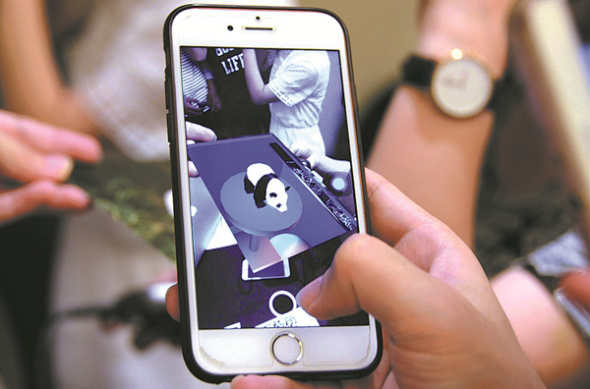 A Beijing firm that will provide VR techno¬logy for a new panda attraction also makes a panda app. LIU PEIPEI / FOR CHINA DAILY A Beijing firm that will provide VR techno¬logy for a new panda attraction also makes a panda app. LIU PEIPEI / FOR CHINA DAILY