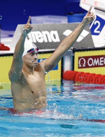 China's Sun Yang celebrates after the Men's 200m Freestyle final of swimming at the 17th FINA World Championships in Budapest, Hungary on July 25, 2017. Sun Yang won the gold medal with 1 minute and 44.39 seconds. (Xinhua/Ding Xu) China's Sun Yang celebrates after the Men's 200m Freestyle final of swimming at the 17th FINA World Championships in Budapest, Hungary on July 25, 2017. Sun Yang won the gold medal with 1 minute and 44.39 seconds. (Xinhua/Ding Xu)