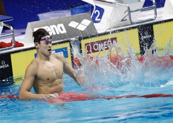China's Sun Yang celebrates after the Men's 200m Freestyle final of swimming at the 17th FINA World Championships in Budapest, Hungary on July 25, 2017. Sun Yang won the gold medal with 1 minute and 44.39 seconds. (Xinhua/Ding Xu) China's Sun Yang celebrates after the Men's 200m Freestyle final of swimming at the 17th FINA World Championships in Budapest, Hungary on July 25, 2017. Sun Yang won the gold medal with 1 minute and 44.39 seconds. (Xinhua/Ding Xu)