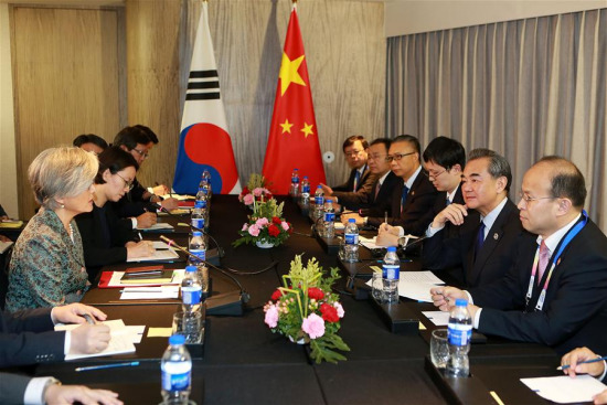 Chinese Foreign Minister Wang Yi (2nd R) meets with South Korean Foreign Minister Kang Kyung-wha (1st L) on the sidelines of a series of ASEAN foreign ministers' meetings in Manila, the Philippines, Aug. 6, 2017. (Xinhua/Rouelle Umali) Chinese Foreign Minister Wang Yi (2nd R) meets with South Korean Foreign Minister Kang Kyung-wha (1st L) on the sidelines of a series of ASEAN foreign ministers' meetings in Manila, the Philippines, Aug. 6, 2017. (Xinhua/Rouelle Umali)