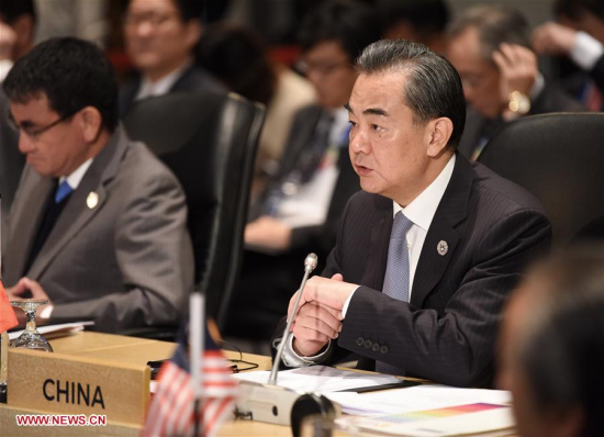 Chinese Foreign Minister Wang Yi (R) speaks during the ASEAN Plus Three Foreign Ministers' Meeting in Manila, the Philippines, Aug. 7, 2017. (Xinhua/Wang Shen) Chinese Foreign Minister Wang Yi (R) speaks during the ASEAN Plus Three Foreign Ministers' Meeting in Manila, the Philippines, Aug. 7, 2017. (Xinhua/Wang Shen)