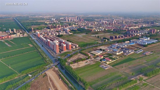 Photo taken on April 21, 2017 shows the scenery of the county seat of Rongcheng, north China's Hebei Province. (Xinhua/Yang Shiyao) Photo taken on April 21, 2017 shows the scenery of the county seat of Rongcheng, north China's Hebei Province. (Xinhua/Yang Shiyao)