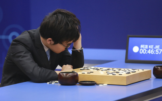 Ke Jie reflects on his play after losing the second game of his match with AlphaGo in Wuzhen, Zhejiang province, on Thursday. (Photo provided to China Daily) Ke Jie reflects on his play after losing the second game of his match with AlphaGo in Wuzhen, Zhejiang province, on Thursday. (Photo provided to China Daily)
