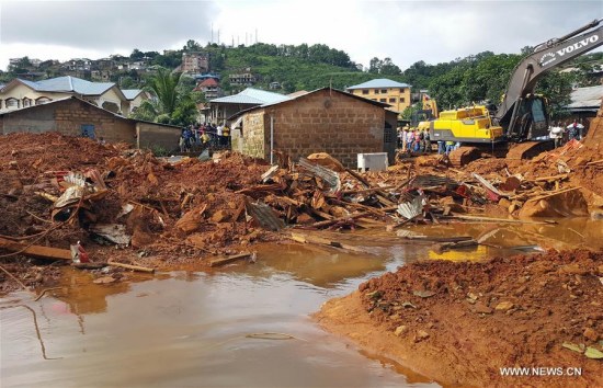 hoto taken on Aug. 15, 2017 shows the mudslide site in Freetown, Sierra Leone. Sierra Leone's President Ernest Bai Koroma has declared seven days of mourning across the country with immediate effect. (Xinhua/Liu Yu) hoto taken on Aug. 15, 2017 shows the mudslide site in Freetown, Sierra Leone. Sierra Leone's President Ernest Bai Koroma has declared seven days of mourning across the country with immediate effect. (Xinhua/Liu Yu)