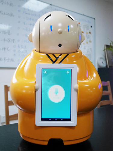 Xian'er, a self-described little monk, is being trained to text in English. (Photo via chinadaily.com.cn) Xian'er, a self-described little monk, is being trained to text in English. (Photo via chinadaily.com.cn)