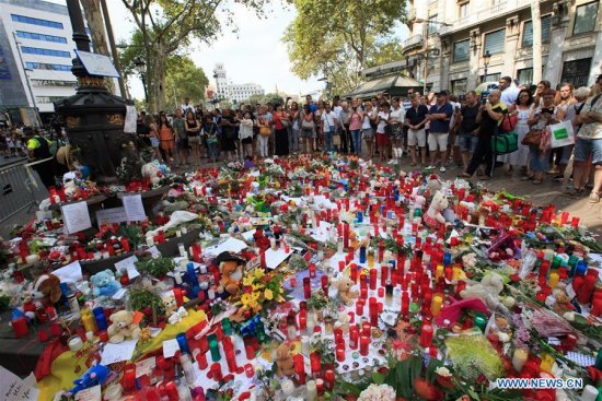 Toys, flowers and candles are placed on the avenue to mourn for victims in the terrorist attacks in the Las Ramblas area of Barcelona, Spain, Aug. 19, 2017. (Xinhua/Xu Jinquan) Toys, flowers and candles are placed on the avenue to mourn for victims in the terrorist attacks in the Las Ramblas area of Barcelona, Spain, Aug. 19, 2017. (Xinhua/Xu Jinquan)