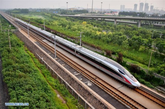 Fuxing train C2001 is seen arriving at Tianjin Railway Station, Aug. 21, 2017. China's new-generation bullet trains, the Fuxing, were put into operation on the Beijing-Tianjin Intercity Railway Aug. 21. (Xinhua/Yang Baosen) Fuxing train C2001 is seen arriving at Tianjin Railway Station, Aug. 21, 2017. China's new-generation bullet trains, the Fuxing, were put into operation on the Beijing-Tianjin Intercity Railway Aug. 21. (Xinhua/Yang Baosen)