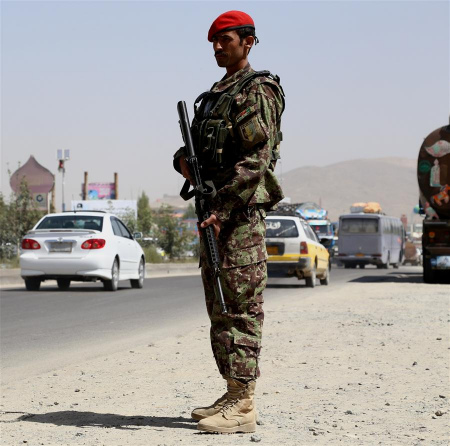 An Afghan security force member stands guard at a security checkpoint in Ghazni province, eastern Afghanistan, Aug. 22, 2017. The Afghan Taliban on Tuesday said that the insurgents will continue the war against U.S. and its allies until the U.S.-led forces leave Afghanistan. (Xinhua/Sayed Mominzadah) An Afghan security force member stands guard at a security checkpoint in Ghazni province, eastern Afghanistan, Aug. 22, 2017. The Afghan Taliban on Tuesday said that the insurgents will continue the war against U.S. and its allies until the U.S.-led forces leave Afghanistan. (Xinhua/Sayed Mominzadah)