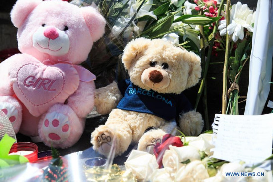 Toy bears are seen to mourn the victims of terror attack on Las Ramblas street, Barcelona, Spain, on Aug. 18, 2017. The number of people killed in Thursday's double terror attacks rose to 14, after a woman died of injuries at the Joan XXIII hospital, the Catalan emergency services confirmed on Friday. (Xinhua/Xu Jinquan) Toy bears are seen to mourn the victims of terror attack on Las Ramblas street, Barcelona, Spain, on Aug. 18, 2017. The number of people killed in Thursday's double terror attacks rose to 14, after a woman died of injuries at the Joan XXIII hospital, the Catalan emergency services confirmed on Friday. (Xinhua/Xu Jinquan)