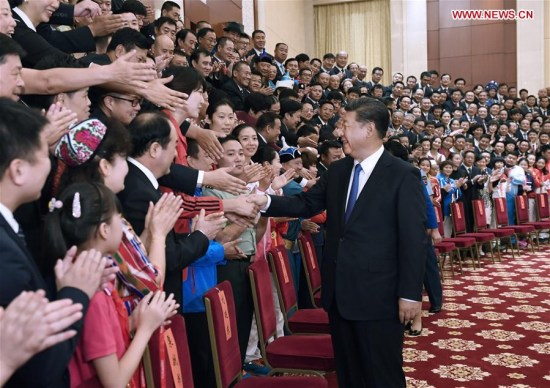 Chinese President Xi Jinping meets with individuals and groups who are advancing China's sporting cause, both professionals and amateurs, as well as representatives of medal winners in sporting events for ordinary people held during the 13th National Games, in north China's Tianjin Municipality, Aug. 27, 2017. (Xinhua/Li Xueren) Chinese President Xi Jinping meets with individuals and groups who are advancing China's sporting cause, both professionals and amateurs, as well as representatives of medal winners in sporting events for ordinary people held during the 13th National Games, in north China's Tianjin Municipality, Aug. 27, 2017. (Xinhua/Li Xueren)