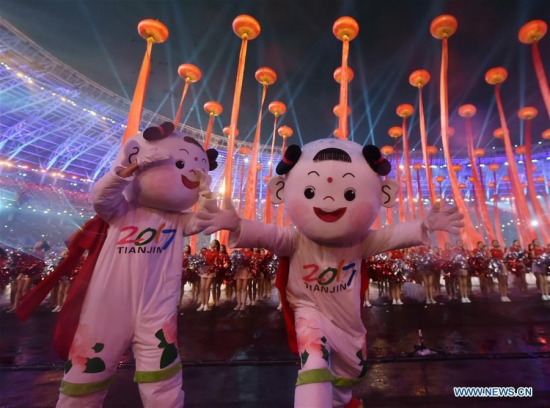 The mascot Jinwa is seen at the opening ceremony of the 13th Chinese National Games in north China's Tianjin, Aug. 27, 2017. /Xinhua Photo The mascot Jinwa is seen at the opening ceremony of the 13th Chinese National Games in north China's Tianjin, Aug. 27, 2017. /Xinhua Photo