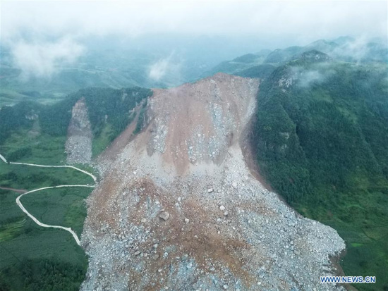Photo taken on Aug. 28, 2018 shows the site of the landslide in Zhangjiawan Township of Nayong County in southwest China's Guizhou Province. (Xinhua/Tao Liang) Photo taken on Aug. 28, 2018 shows the site of the landslide in Zhangjiawan Township of Nayong County in southwest China's Guizhou Province. (Xinhua/Tao Liang)