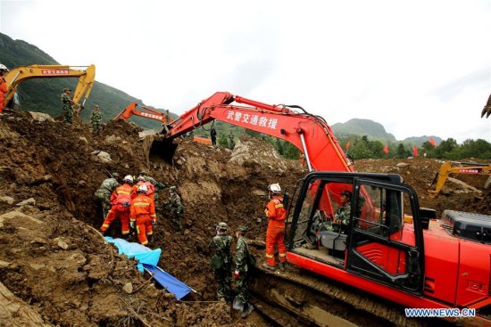 Rescuers use machinery to search for missing people at the site of a landslide in Nayong County in southwest China's Guizhou Province Aug. 30, 2017. The death toll from a landslide in southwest China's Guizhou Province Monday morning has risen to 23, with 12 still missing, rescuers said Wednesday. (Xinhua/Xue Zhenming) Rescuers use machinery to search for missing people at the site of a landslide in Nayong County in southwest China's Guizhou Province Aug. 30, 2017. The death toll from a landslide in southwest China's Guizhou Province Monday morning has risen to 23, with 12 still missing, rescuers said Wednesday. (Xinhua/Xue Zhenming)