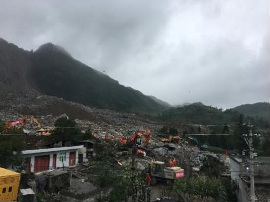 Search and rescue operation continues as more bodies are dug out from the rubbles. About 10 people remain missing as of Wednesday night. / CGTN photo Search and rescue operation continues as more bodies are dug out from the rubbles. About 10 people remain missing as of Wednesday night. / CGTN photo