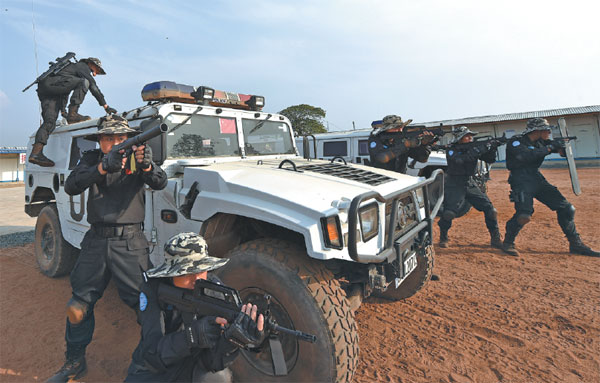 Chinese peacekeepers train in Monrovia, Liberia, in January. (Photos by Li Jinhua / Xinhua) Chinese peacekeepers train in Monrovia, Liberia, in January. (Photos by Li Jinhua / Xinhua)