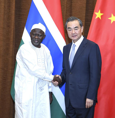 Chinese Foreign Minister Wang Yi meets with his Gambian counterpart Ousainou Darboe in Beijing on Tuesday. (Photo/Xinhua) Chinese Foreign Minister Wang Yi meets with his Gambian counterpart Ousainou Darboe in Beijing on Tuesday. (Photo/Xinhua)