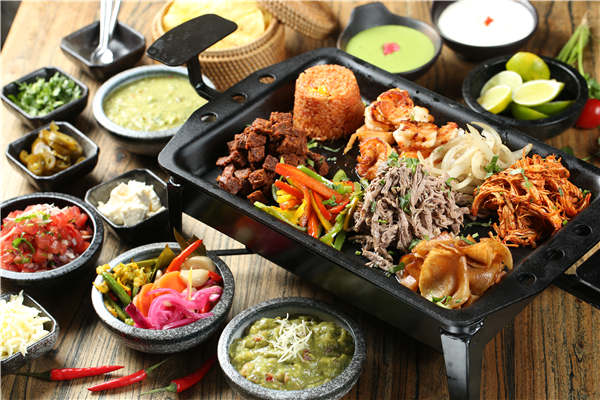 The newly opened Q Mex restaurant in Beijing offers authentic Mexican cuisine with ingredients imported from Mexico. (Photo provided to China Daily) The newly opened Q Mex restaurant in Beijing offers authentic Mexican cuisine with ingredients imported from Mexico. (Photo provided to China Daily)