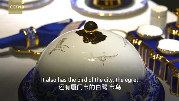 A close up of the domed lid which features a map of Gulangyu Island and egrets. (Photo/CGTN) A close up of the domed lid which features a map of Gulangyu Island and egrets. (Photo/CGTN)