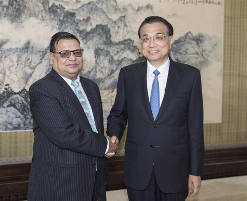 Chinese Premier Li Keqiang (R) meets with Nepalese Deputy Prime Minister and Foreign Minister Krishna Bahadur Mahara in Beijing, capital of China, Sept. 7, 2017. (Xinhua/Li Tao) Chinese Premier Li Keqiang (R) meets with Nepalese Deputy Prime Minister and Foreign Minister Krishna Bahadur Mahara in Beijing, capital of China, Sept. 7, 2017. (Xinhua/Li Tao)