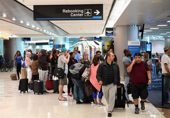 Passengers queue to rebook their flights which have been canceled due to the effect of hurricane Irma at Miami International Airport in Miami, Florida, the United States, on Sept. 8, 2017. (Xinhua/Yin Bogu) Passengers queue to rebook their flights which have been canceled due to the effect of hurricane Irma at Miami International Airport in Miami, Florida, the United States, on Sept. 8, 2017. (Xinhua/Yin Bogu)