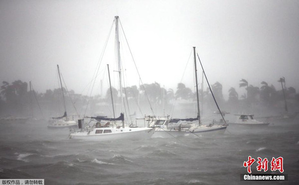 Boats are battered by rough waves at a beach in Florida, as Hurricane Irma arrives in south Florida on Sunday. (Photo/Agencies) Boats are battered by rough waves at a beach in Florida, as Hurricane Irma arrives in south Florida on Sunday. (Photo/Agencies)