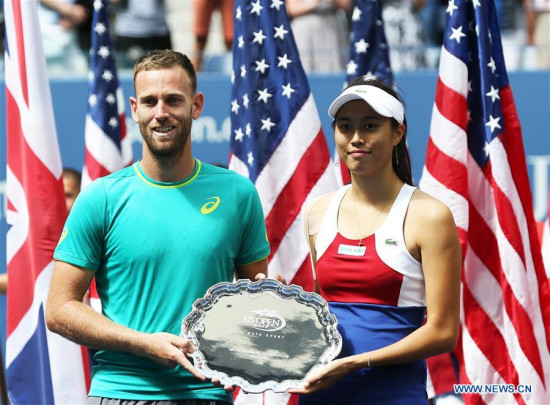 Hao-Ching Chan (R) of Chinese Taipei and Michael Venus of New Zealand attend the awarding ceremony after their mixed doubles final match against Martina Hingis of Switzerland and Jamie Murray of Great Britain at the 2017 U.S. Open in New York, the United States, Sept. 9, 2017. Martina Hingis and Jamie Murray won 2-1 to claim the title. (Xinhua/Qin Lang) Hao-Ching Chan (R) of Chinese Taipei and Michael Venus of New Zealand attend the awarding ceremony after their mixed doubles final match against Martina Hingis of Switzerland and Jamie Murray of Great Britain at the 2017 U.S. Open in New York, the United States, Sept. 9, 2017. Martina Hingis and Jamie Murray won 2-1 to claim the title. (Xinhua/Qin Lang)