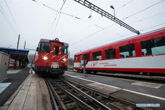 Trains are stationed at the platform of Andermatt train station in the Uri canton, central-southern Switzerland, on Sept. 11, 2017. Two trains collided in the central-southern Swiss town of Andermatt at around 11:30 on Monday morning, injuring about 30 people, local police said. (Xinhua/Xu Jinquan)