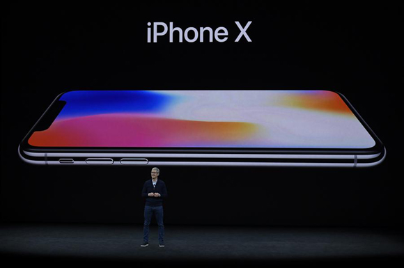 Apple's Chief Executive Officer (CEO) Tim Cook introduces new iPhone X during a special event in Cupertino, California, the United States on Sept. 12, 2017. Apple Inc. released a series of new products and services in Cupertino on Tuesday. (Xinhua) Apple's Chief Executive Officer (CEO) Tim Cook introduces new iPhone X during a special event in Cupertino, California, the United States on Sept. 12, 2017. Apple Inc. released a series of new products and services in Cupertino on Tuesday. (Xinhua)