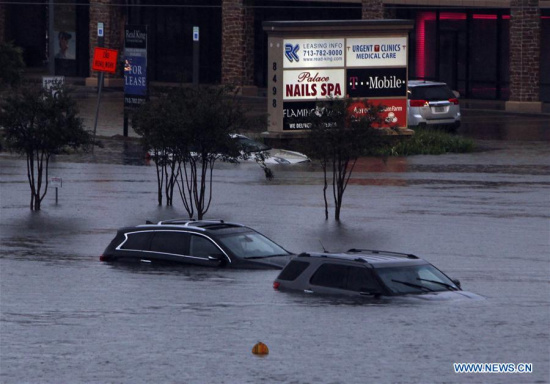 Vehicles are submerged in flood in great Houston area, Texas, the United States, Aug. 27, 2017 as the Hurricane Harvey made its strong landfall over the Texas Gulf Coast Friday night. (Xinhua/Song Qiong) Vehicles are submerged in flood in great Houston area, Texas, the United States, Aug. 27, 2017 as the Hurricane Harvey made its strong landfall over the Texas Gulf Coast Friday night. (Xinhua/Song Qiong)