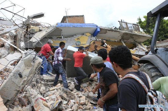 Volunteers remove debris of a collapsed building in Jojutla, state of Morelos, Mexico, on Sept. 20, 2017. (Xinhua/Armando Solis) Volunteers remove debris of a collapsed building in Jojutla, state of Morelos, Mexico, on Sept. 20, 2017. (Xinhua/Armando Solis)