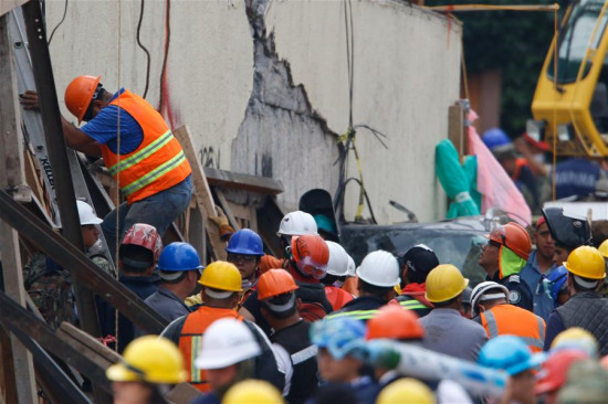 Rescue workers and volunteers search for survivors at the Enrique Rebsamen school in Mexico City, capital of Mexico, on Sept. 21, 2017. (Xinhua/Francisco Canedo) Rescue workers and volunteers search for survivors at the Enrique Rebsamen school in Mexico City, capital of Mexico, on Sept. 21, 2017. (Xinhua/Francisco Canedo)