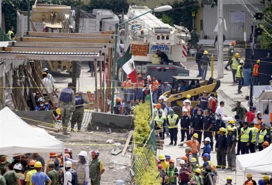 Rescuers search for survivors at the Enrique Rebsamen school after an earthquake in Mexico City, capital of Mexico, on Sept. 20, 2017. (Xinhua/David de la Paz) Rescuers search for survivors at the Enrique Rebsamen school after an earthquake in Mexico City, capital of Mexico, on Sept. 20, 2017. (Xinhua/David de la Paz)