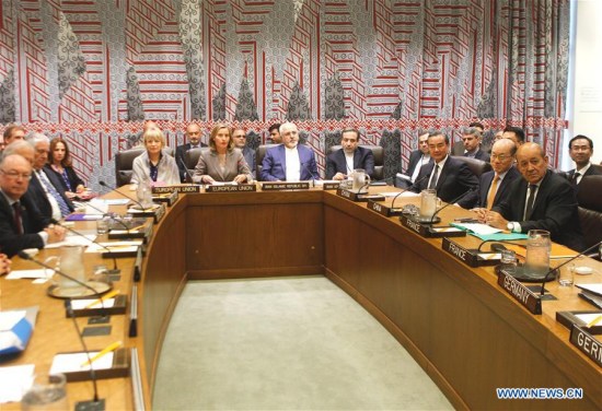 Chinese Foreign Minister Wang Yi (3rd R, front) participates in a meeting between the foreign ministers of the six world powers of Britain, China, France, Germany, Russia and the United States, and Iran at the UN Headquarters in New York, Sept. 20, 2017. (Xinhua) Chinese Foreign Minister Wang Yi (3rd R, front) participates in a meeting between the foreign ministers of the six world powers of Britain, China, France, Germany, Russia and the United States, and Iran at the UN Headquarters in New York, Sept. 20, 2017. (Xinhua)