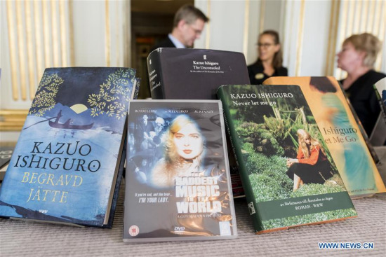 Photo taken on Oct. 5, 2017 shows some literary works of Kazuo Ishiguro, the winner of the Nobel Prize in Literature 2017, in Stockholm, Sweden. The Nobel Prize in Literature for 2017 was awarded to Kazuo Ishiguro who, in novels of great emotional force, has uncovered the abyss beneath our illusory sense of connection with the world, the Swedish Academy announced in Stockholm on Thursday. (Xinhua/Shi Tiancheng) Photo taken on Oct. 5, 2017 shows some literary works of Kazuo Ishiguro, the winner of the Nobel Prize in Literature 2017, in Stockholm, Sweden. The Nobel Prize in Literature for 2017 was awarded to Kazuo Ishiguro who, in novels of great emotional force, has uncovered the abyss beneath our illusory sense of connection with the world, the Swedish Academy announced in Stockholm on Thursday. (Xinhua/Shi Tiancheng)